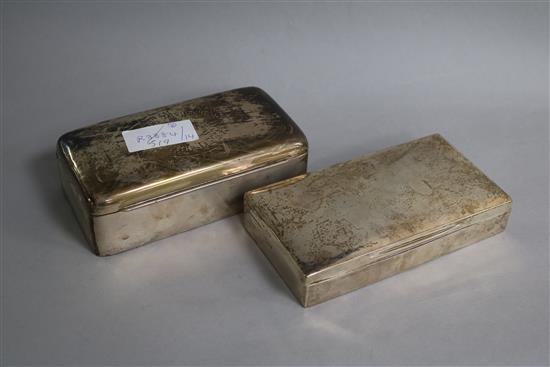 Two George V silver mounted cigarette boxes.